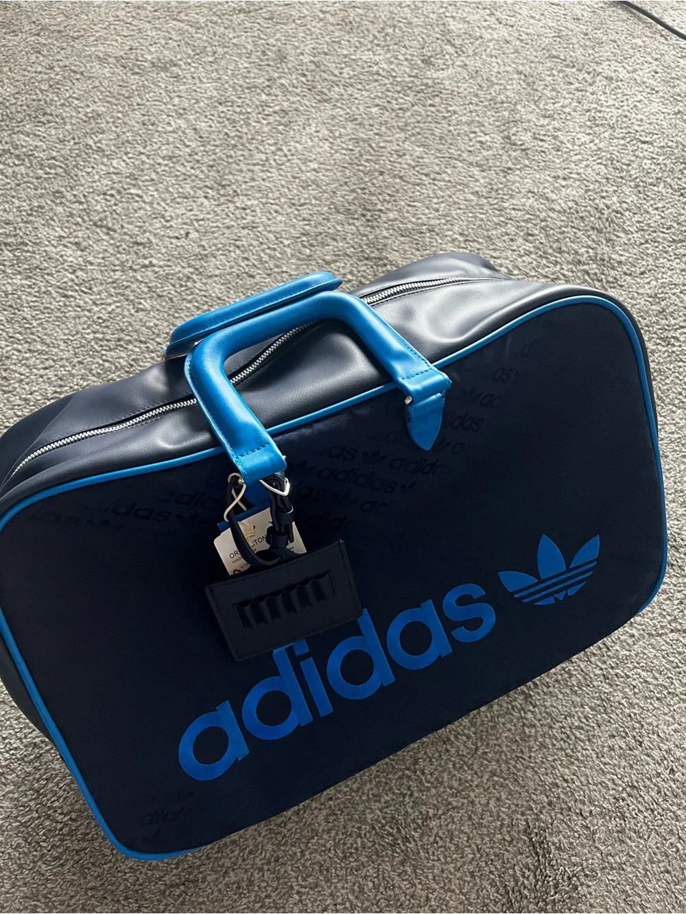 adidas Navy Duffel Bag with Bright Blue Accents